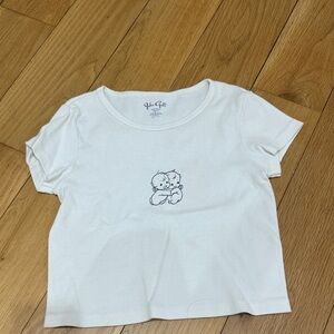Brandy Melville Cream Tee with Angel Baby Design